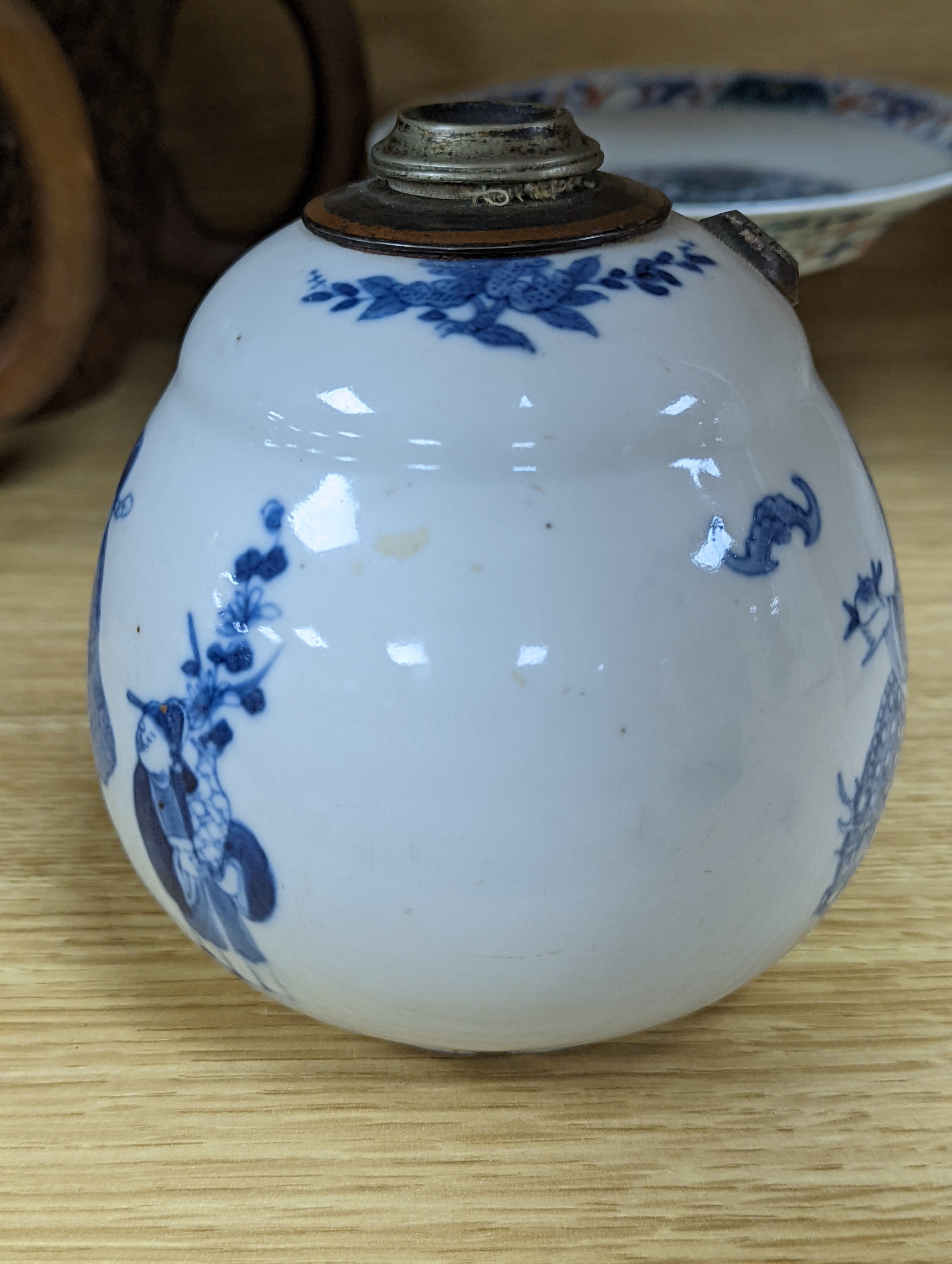 A Chinese blue and white water pipe vessel, a doucai stem dish and a Japanese Imari bowl, 19th century, (3)
